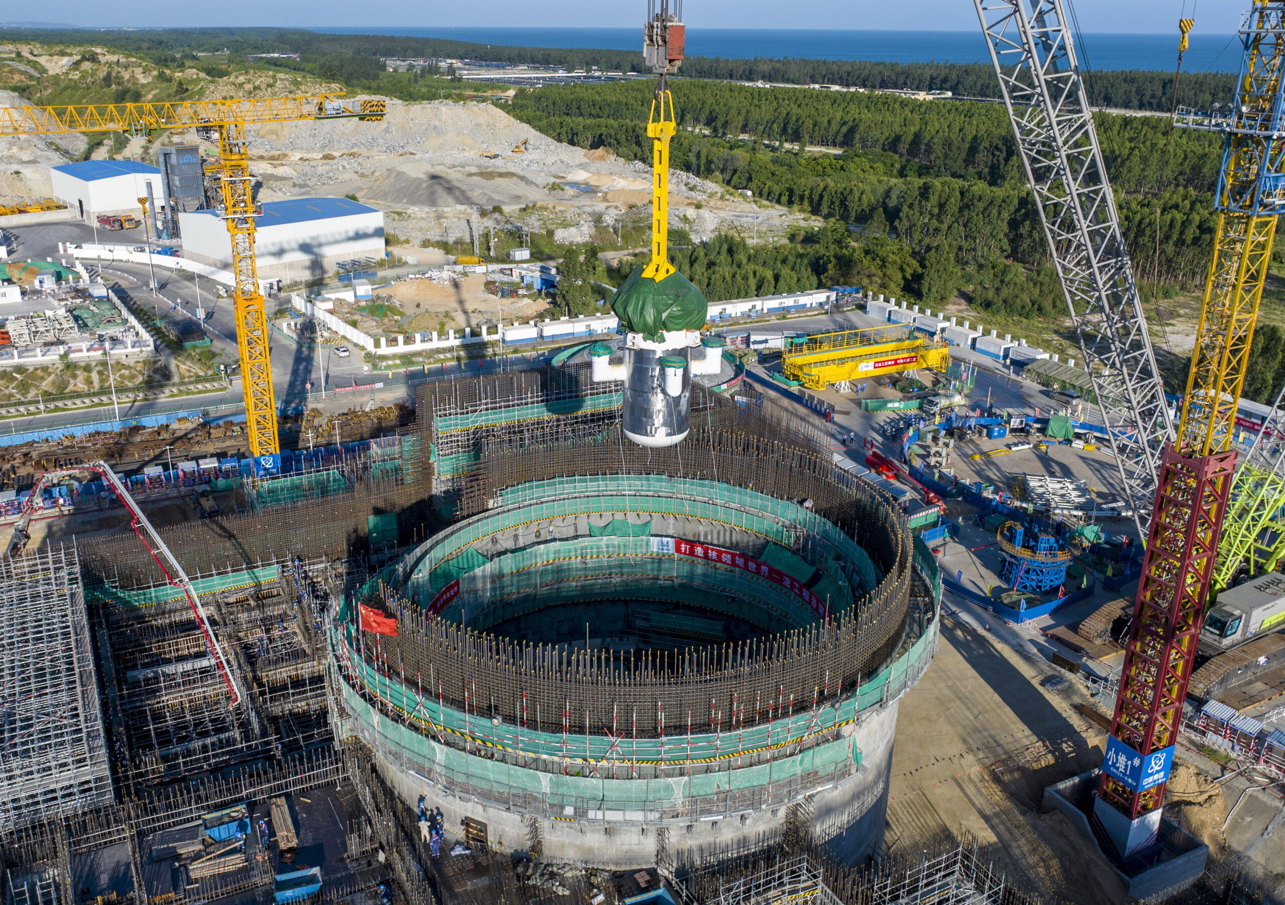 CHANGJIANG, CHINA - AUGUST 10: Aerial view of the core module of China s Linglong One, the world s first commercial small modular reactor SMR, installed on August 10, 2023 in Changjiang Li Autonomous County, Hainan Province of China. Linglong One, which is self-developed by the China National Nuclear Corporation, was installed successfully in Hainan on August 10. PUBLICATIONxNOTxINxCHN Copyright: xChinaxNewsxServicex 111448995494